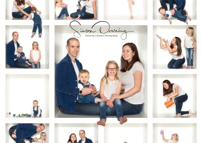 Smiling family posing in various boxes Mum dad and two children Chester family photographer