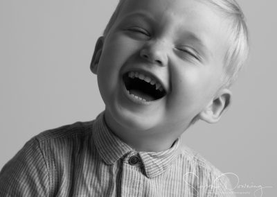 Child laughing uncontrolably kids family photographer chester