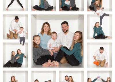 Family in various poses in a box having fun Wirral family photographer