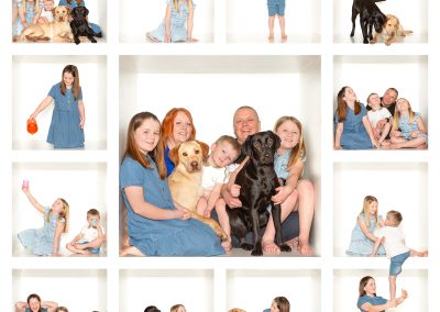 Family smiling in various different poses together with their dogs Wirral family photographer